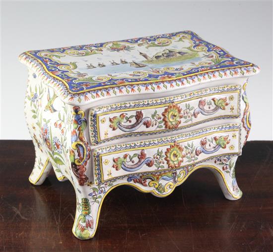 A French faience model of a two drawer commode, late 19th century, width 20.5cm (8in.)